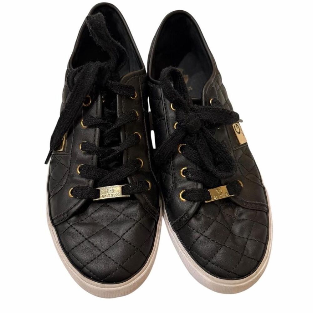 G By Guess Black quilted sneakers with gold accents